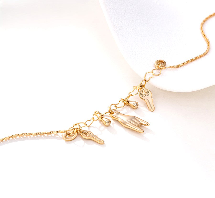 18K Gold Plated Charm Anklet with Hand, Key, Horseshoe, and Wishbone Charms image 4