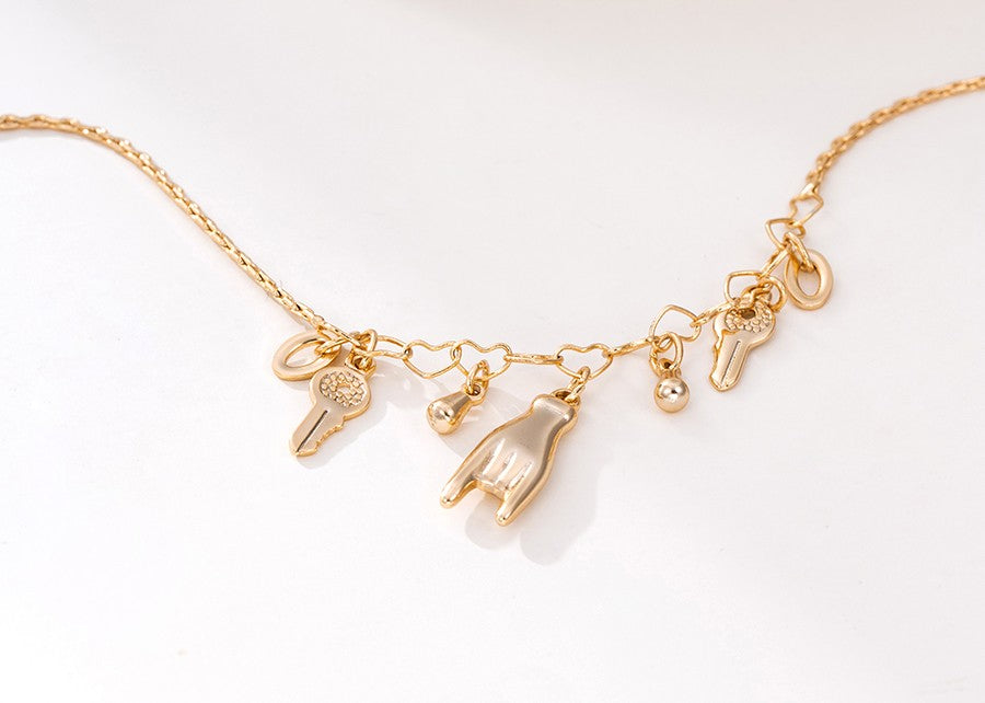 18K Gold Plated Charm Anklet with Hand, Key, Horseshoe, and Wishbone Charms image 0
