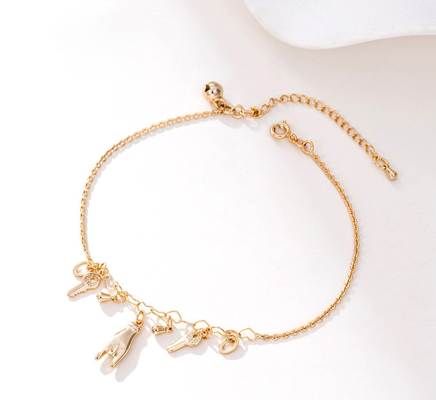 18K Gold Plated Charm Anklet with Hand, Key, Horseshoe, and Wishbone Charms image 3