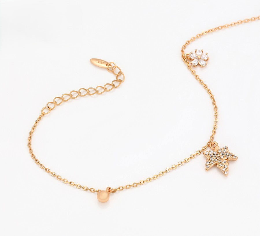 Delicate Gold Chain Bracelet with Leaf and Floral Charms and Sparkling Crystals image 0