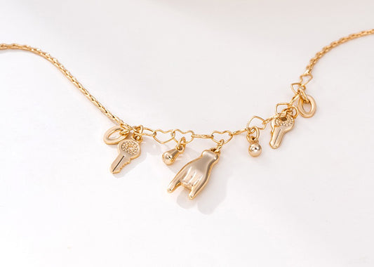 18K Gold Plated Charm Anklet with Hand, Key, Horseshoe, and Wishbone Charms image 0