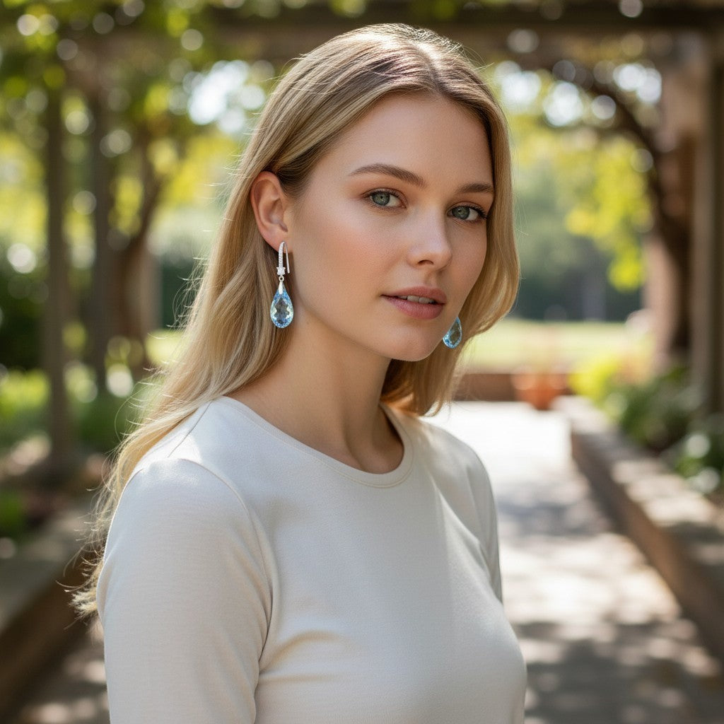 Aquamarine crystal teardrop dangle earrings, platinum plated